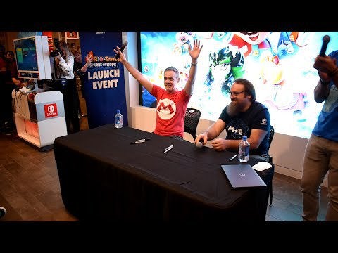 Grant Kirkhope leads the crowd in the "DK Rap" at Nintendo NYC Store
