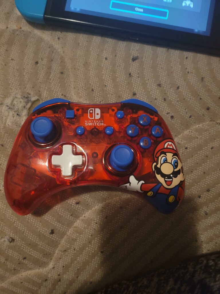 I can't find the sync button on this controller, am I being stupid or is there not one?