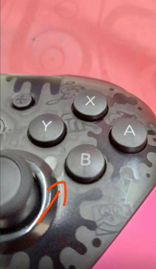 a way of checking whether your pro controller is legit:the legit one's B button has a notable scratch