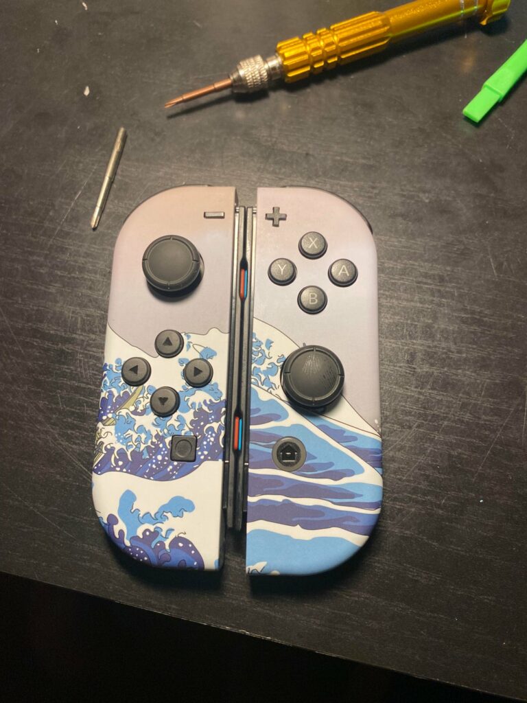 Since we’re posting Switch Shell Swaps, here is the first one I ever did. The Great Waves shell mod looked lovely. Now, I bought a mint green shell and I love it just as much.