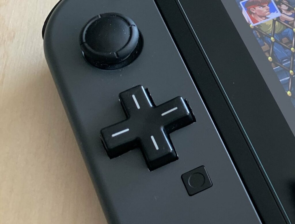 A mod to convert to a rubber-membrane D-Pad on the official Nintendo Switch Joycon