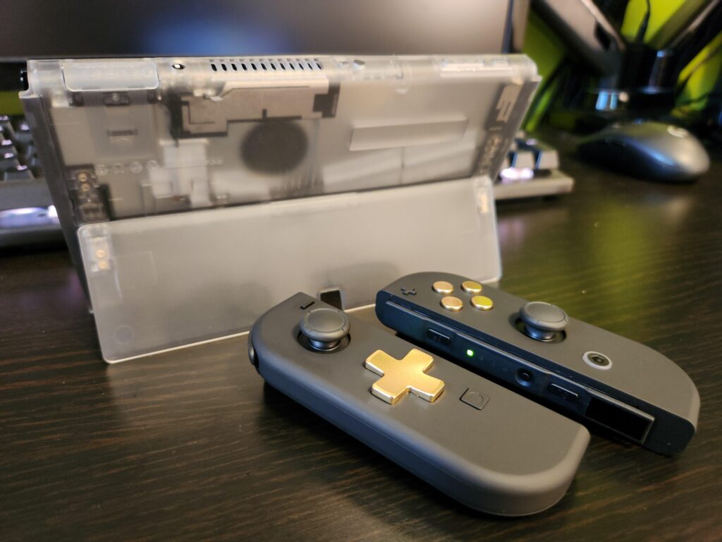 Boxy Pixel brass buttons (with ProtectaClear brass coating) fit in eXtremeRate shells with minor cutting and sanding