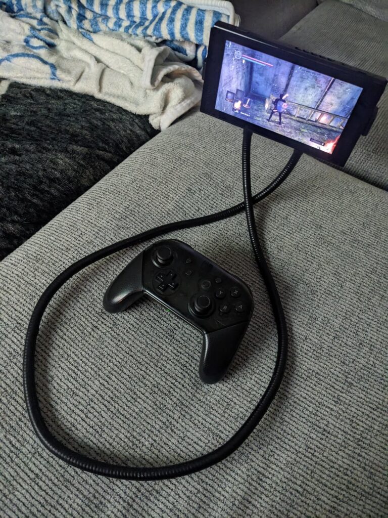 The actual best way to play handheld at home: Neck mounted phone holder and a Pro Controller