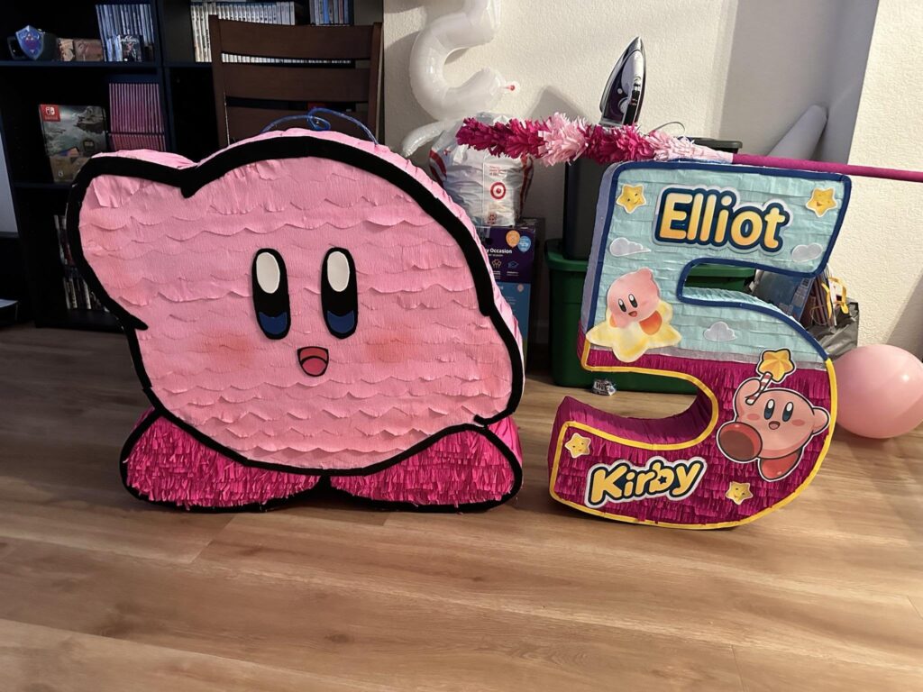 My son turned 5 today and loves Kirby, our friend made this piñata for him.
