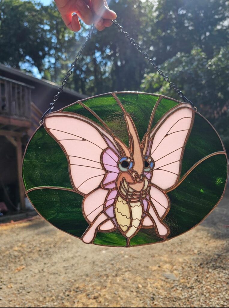 I made this stained glass Venomoth