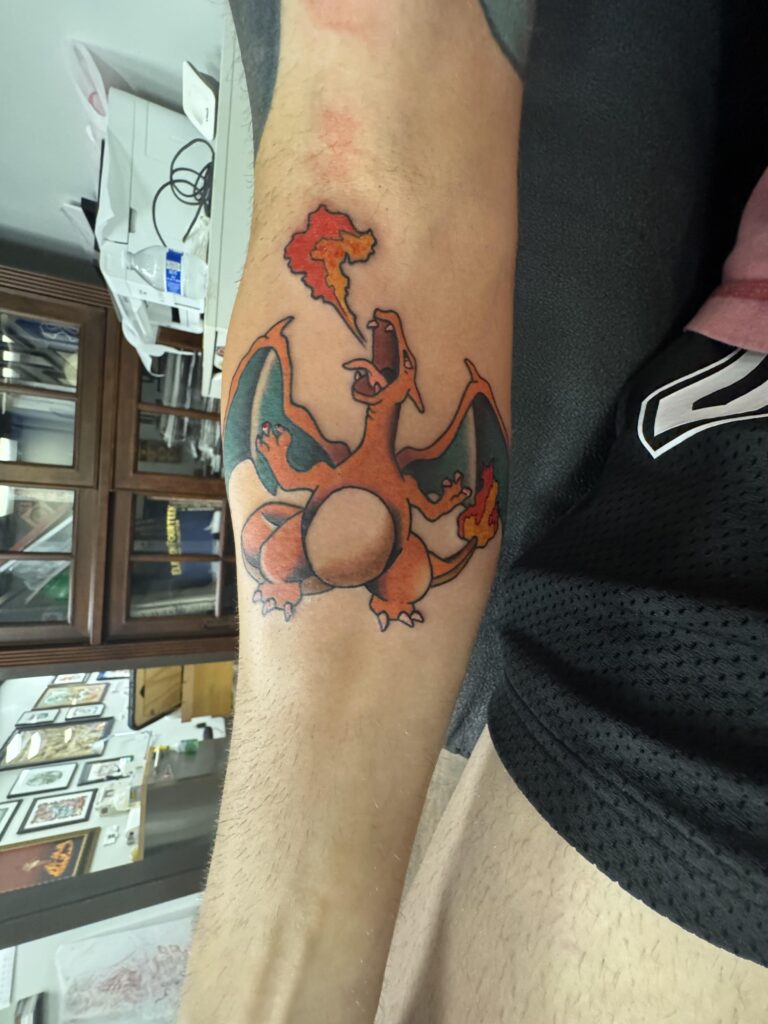 Got an  OG charizard tattoo today 😍