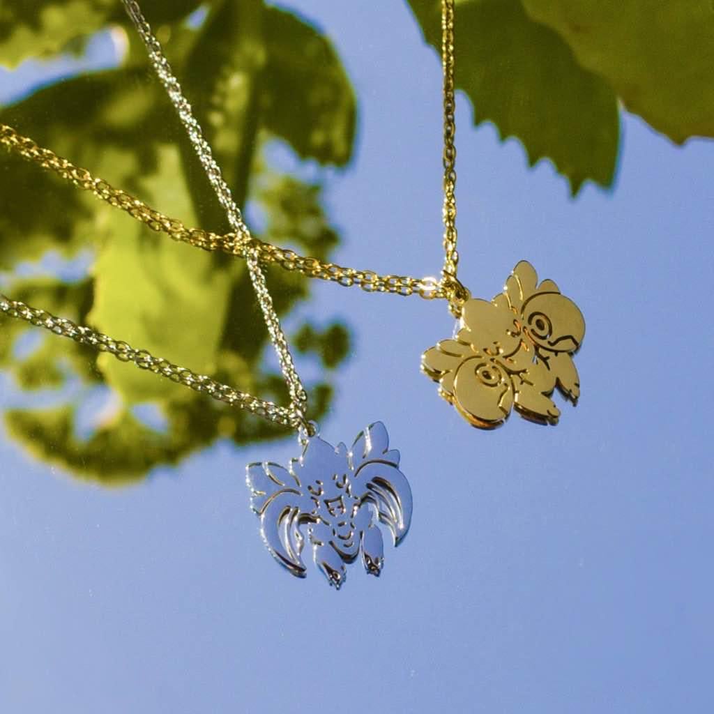 Made these Scyther and Scizor friendship necklaces for me and my bestie!