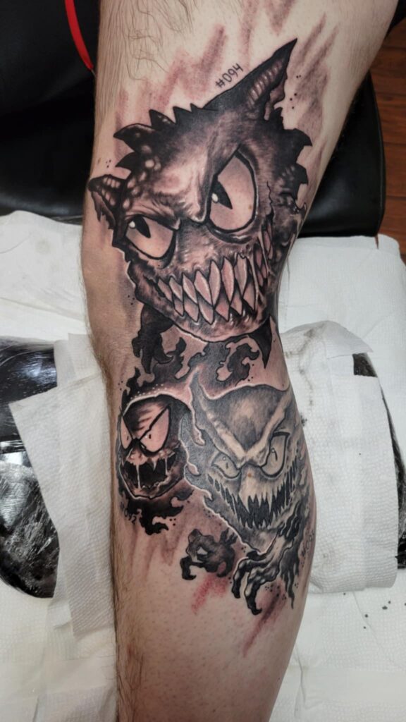 Added more to my dark art  pokemon leg sleeve.