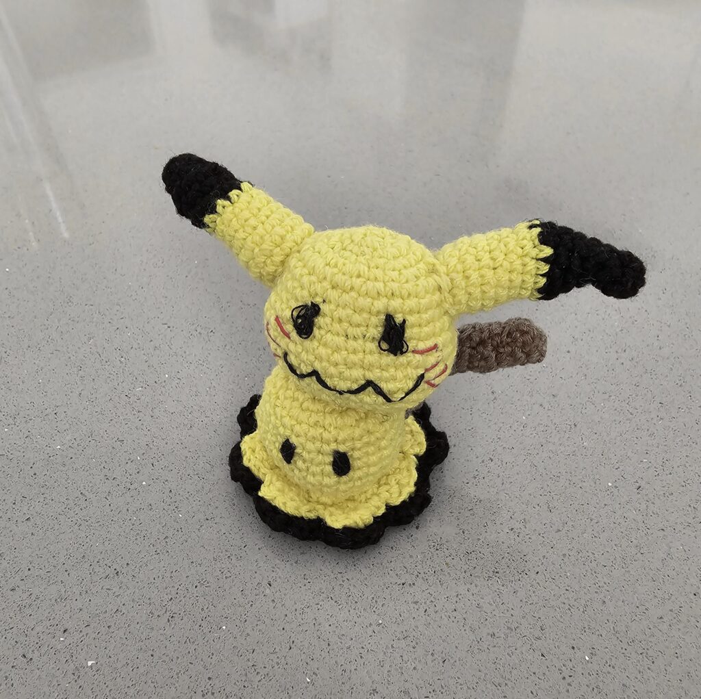 I just wanted to share this little crochet Mimikyu that my auntie made for me!