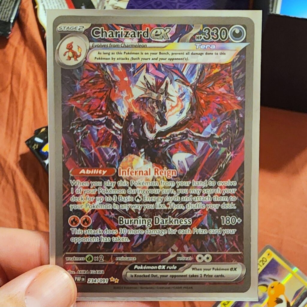 I opened 1 box of paldean fates and got the chase card. Im so baffled.