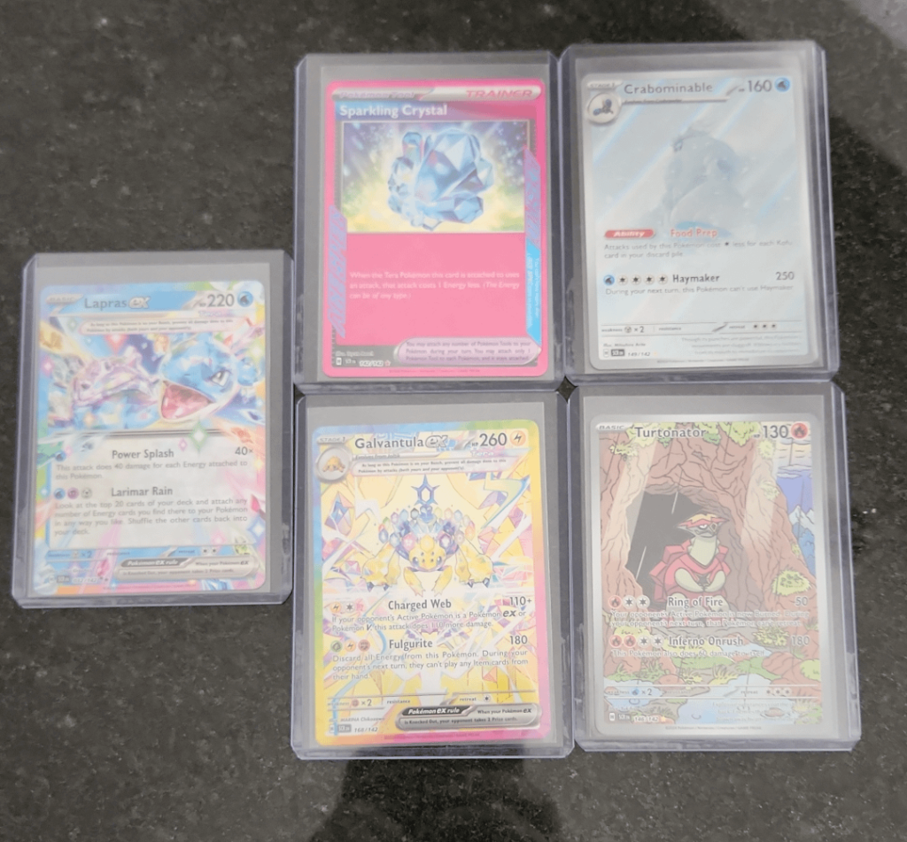 Pulls from my first 12 packs of a 36 pack booster box, gf opened the 4 on the right, absolutly destroyed me in the pack battle 😂