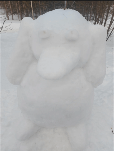 I made a psyduck out of snow. it's about life size.