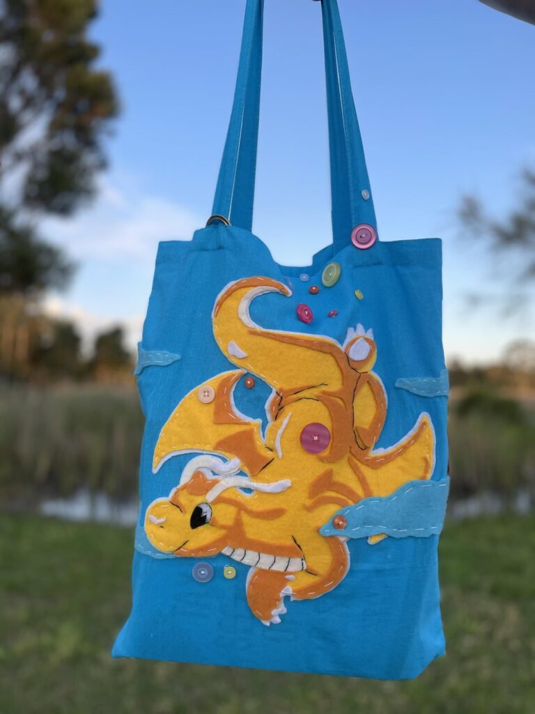 I made a Dragonite tote bag for my boyfriend (its his fave Pokemon) [OC]
