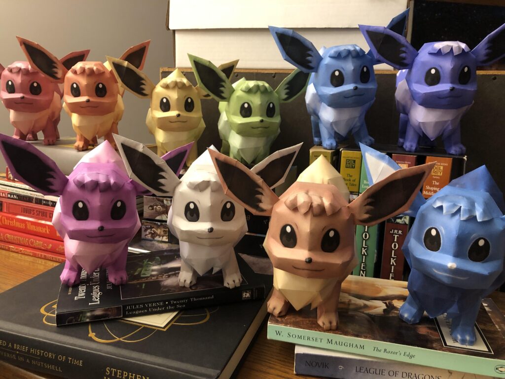 [OC] I handmade a rainbow of Eevee models out of paper!