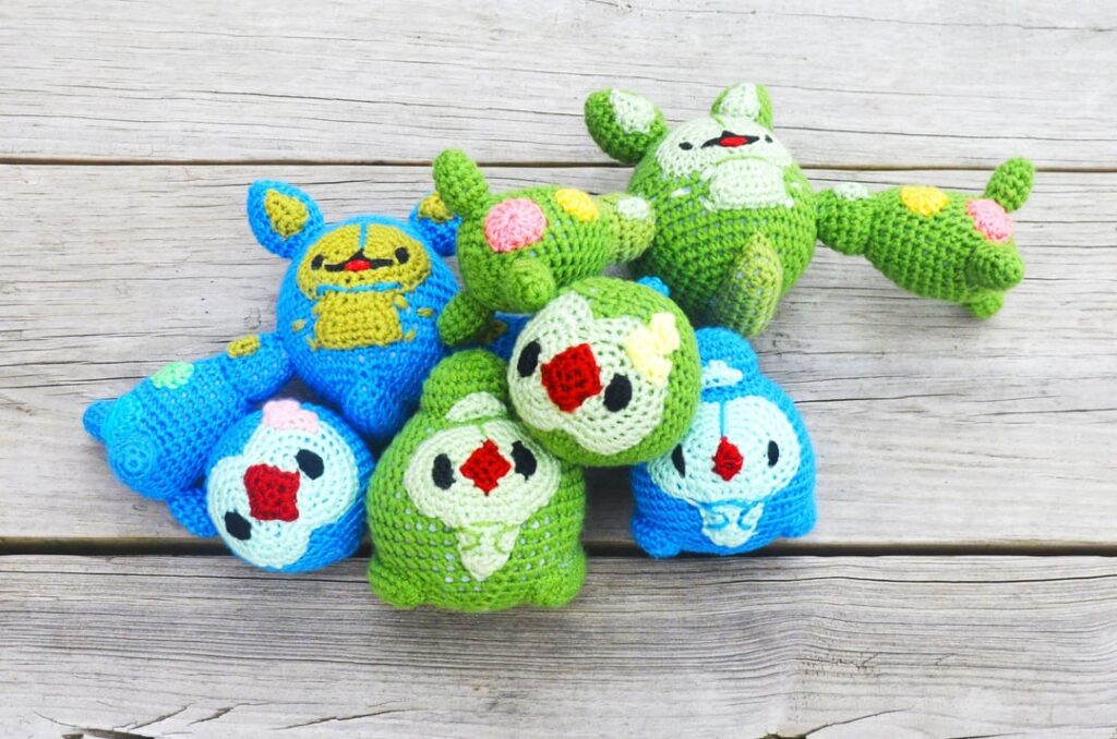 I crocheted a happy Reuniclus jiggly-wiggly family! (OC)
