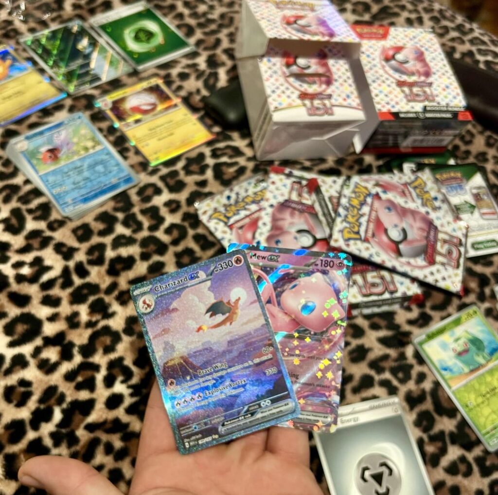 My boyfriend finally got his Charizard!! 🤯 #151
