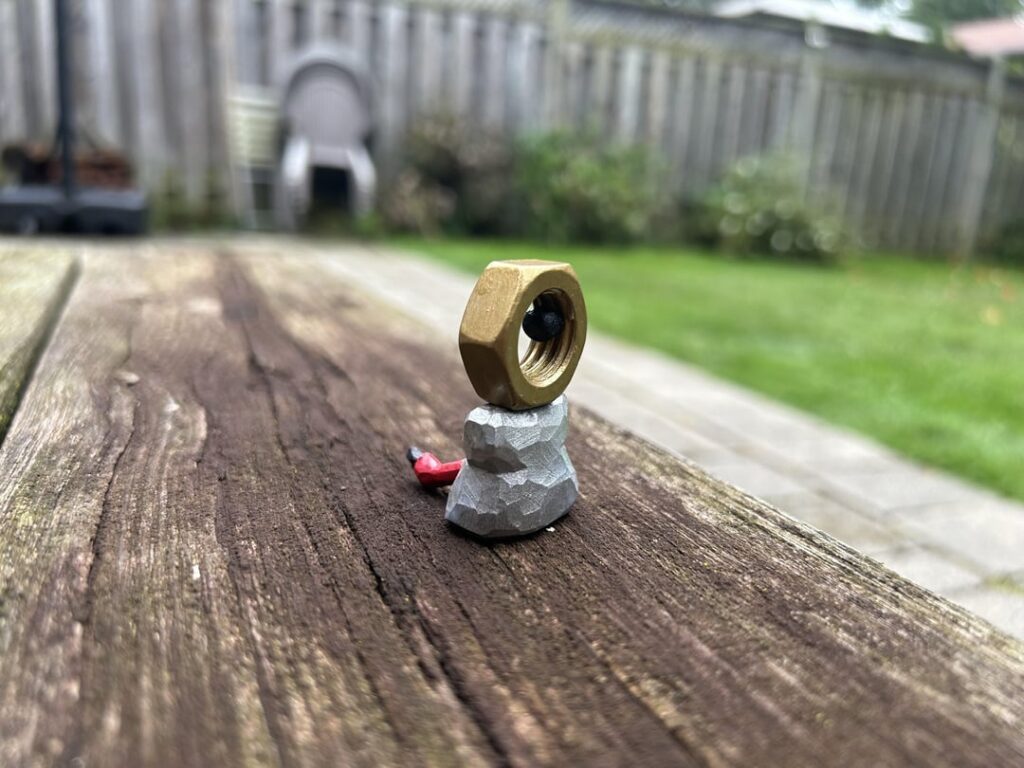 I made Meltan using a real bolt and carved wood