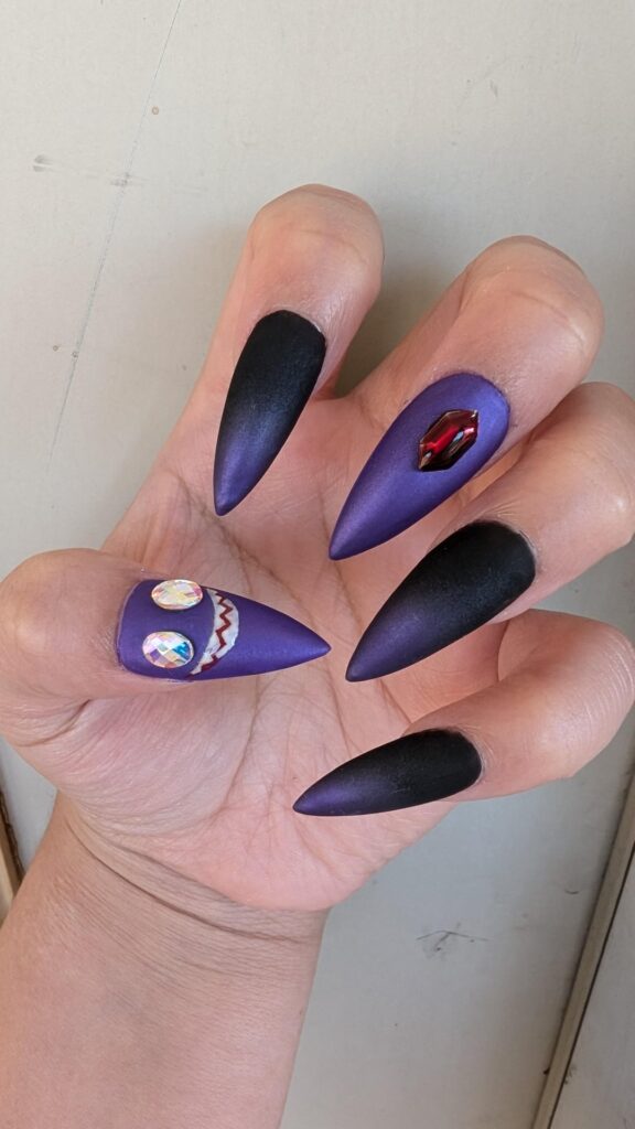 I got Sableye nails done!
