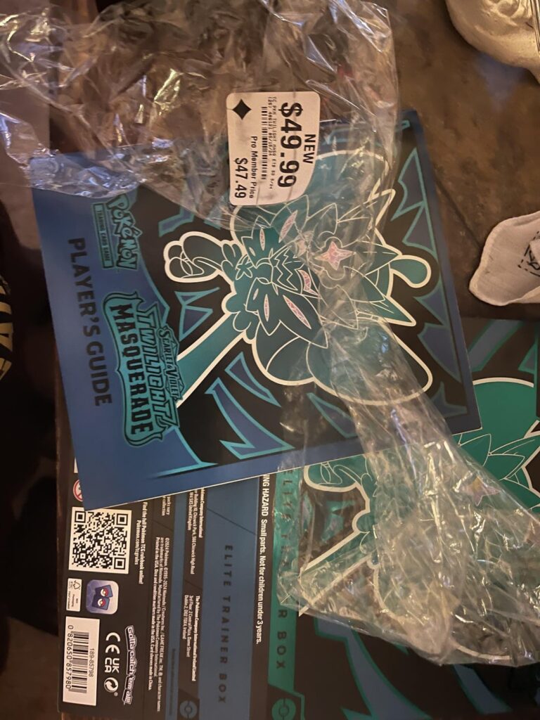 Bought a twilight masquerade Etb from GameStop and contained no packs but duplicate items