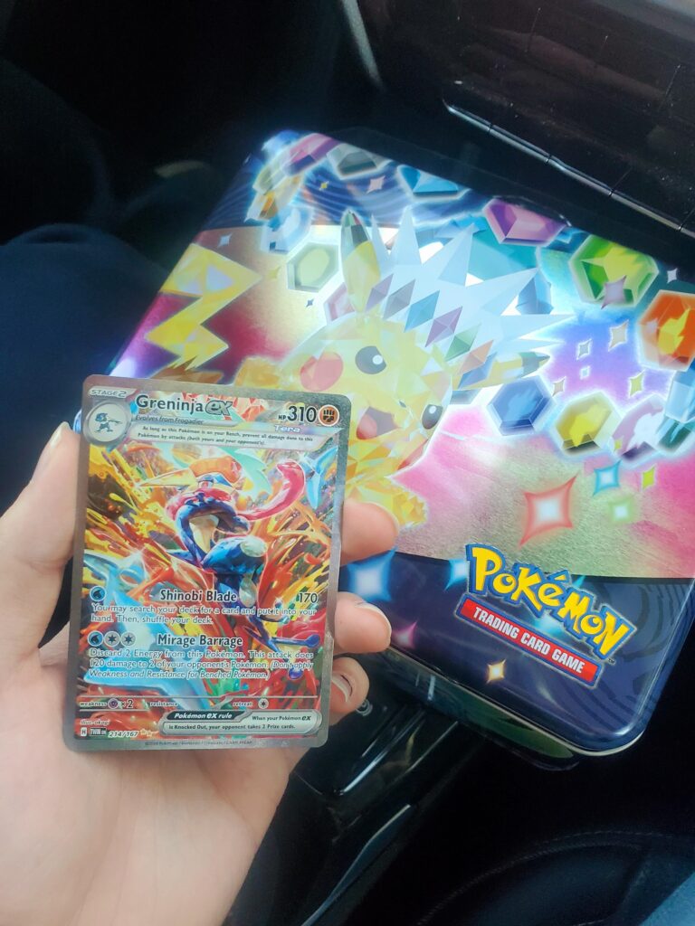Pulled *THE* Greninja EX from the one Twilight Masquerade pack given in the tin!