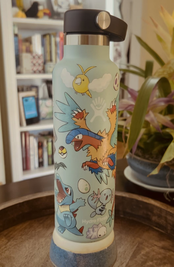 My friend painted a water bottle with all my favorite Pokemon!