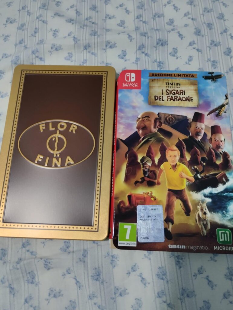 My copy of TinTin and the cigars of the pharaoh just arrived.Wasnt expecting a custom cartride case.Looks great.It was inside a cardboard case i tought i mistook for the cartridge case.