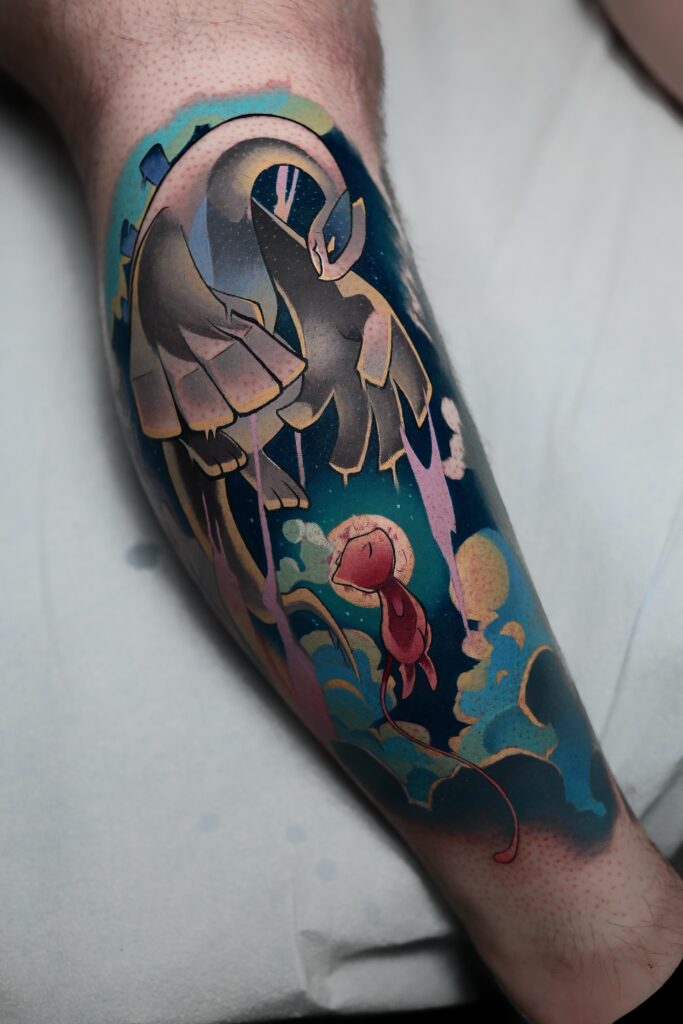 Lugia and Mew Tattoo my husband did