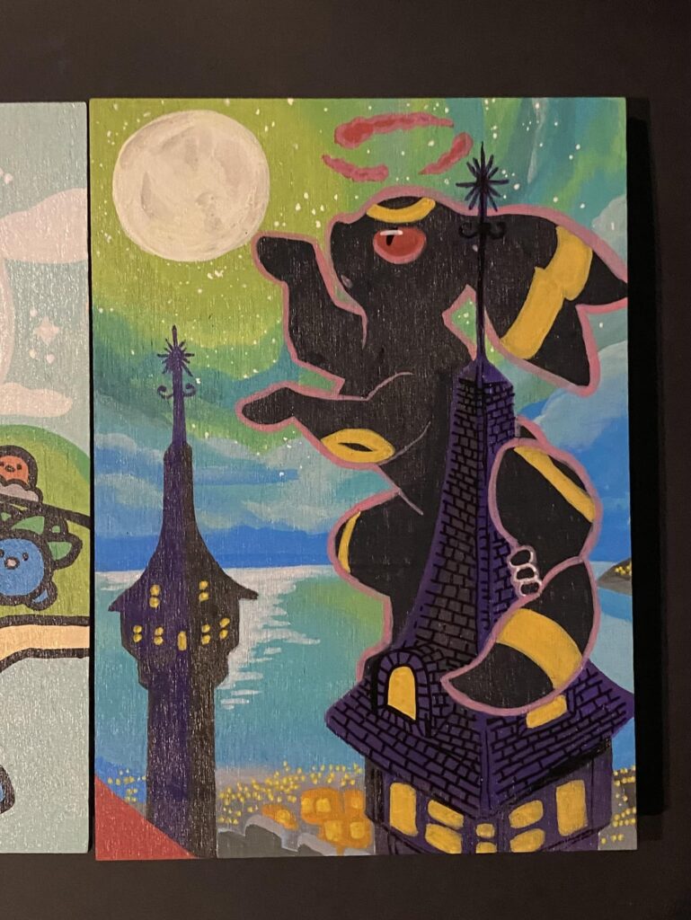 Moonbreon painted on a slab of wood.