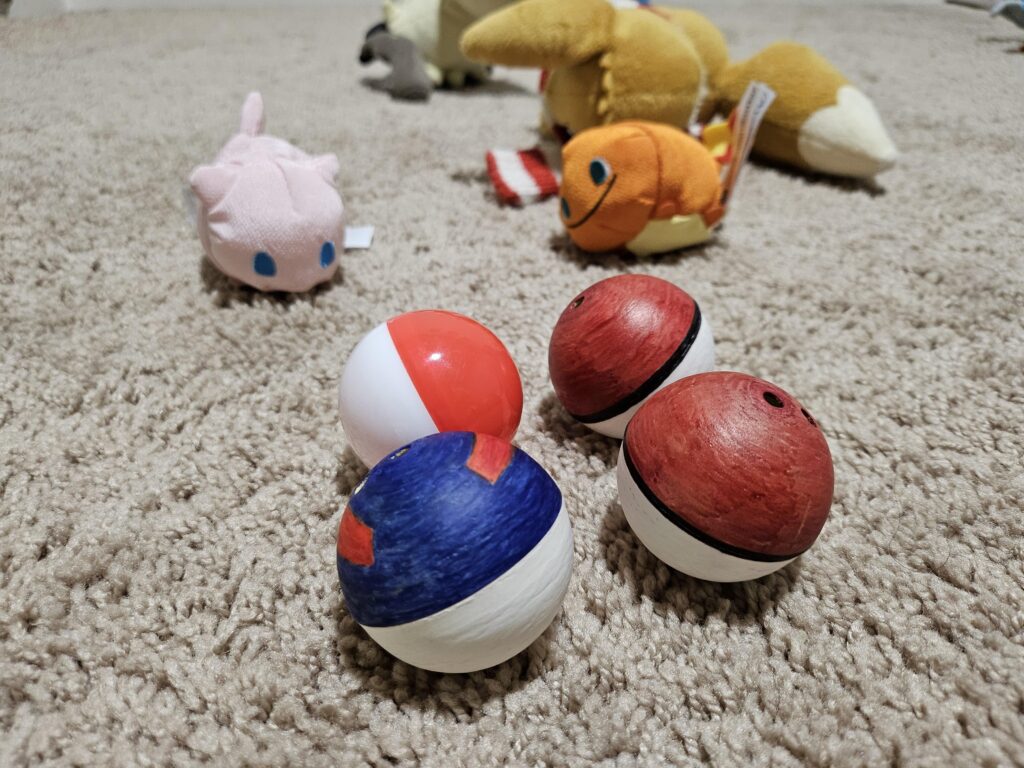 repurposed old gachapon balls into pokeballs for my daughter to start her own journey with