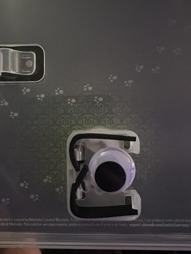 My son’s copy of Luigi’s Mansion 2 HD for Christmas was taken out and replaced with Googly eyes.