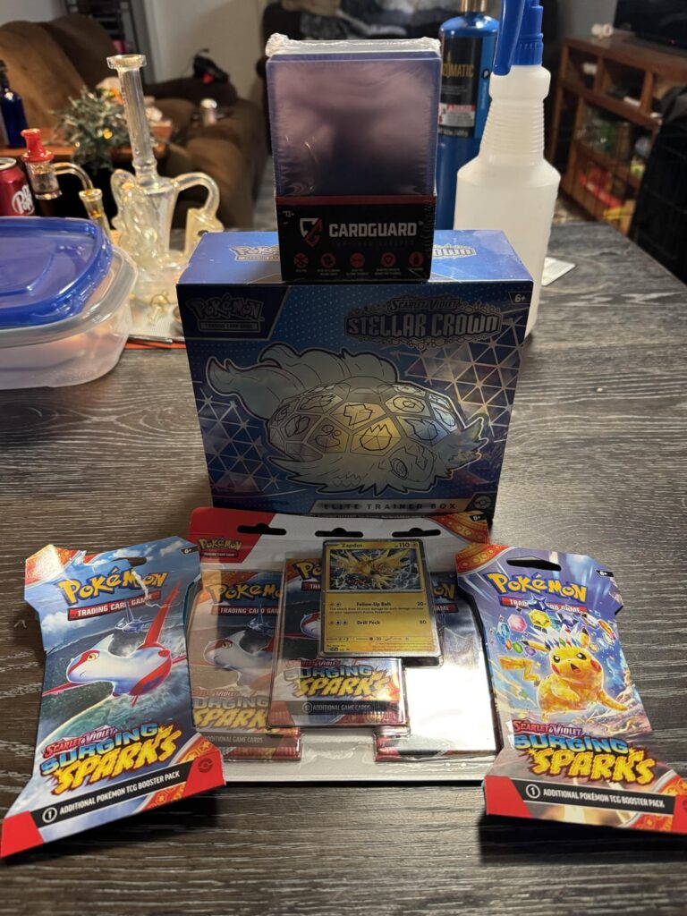 Started my collection today with a Stellar Crown ETB and a few Surging Sparks Booster packs