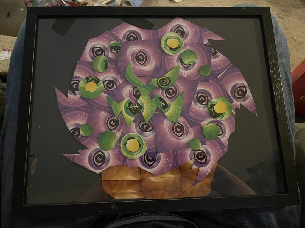 My sister made a collage of my favorite, Spiritomb, out of TCG energy cards!