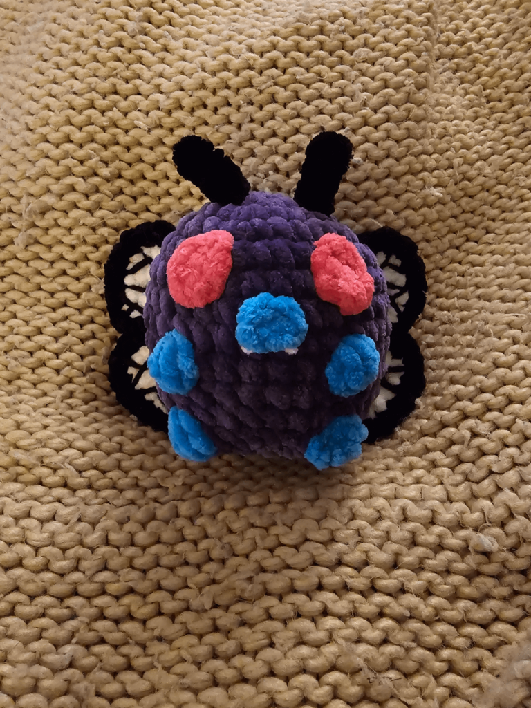 So my wife crocheted a fat Butterfree, and it's the greatest thing.