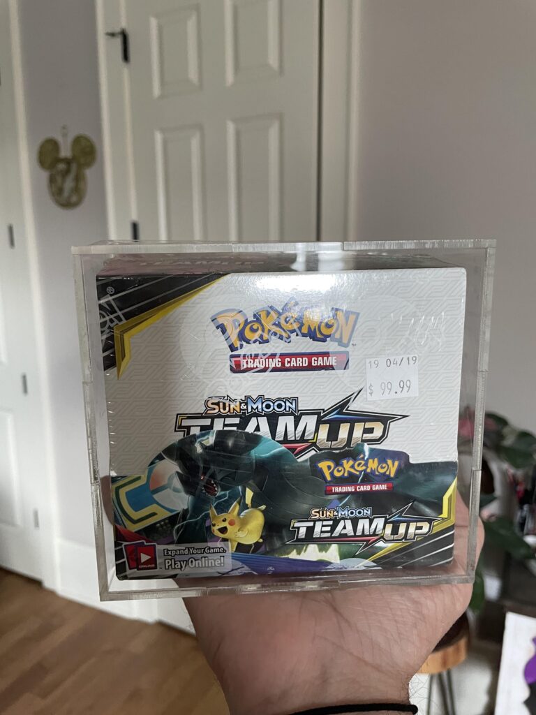 My prized possession as a retired collector. $99.99 retail sticker Team Up booster box.