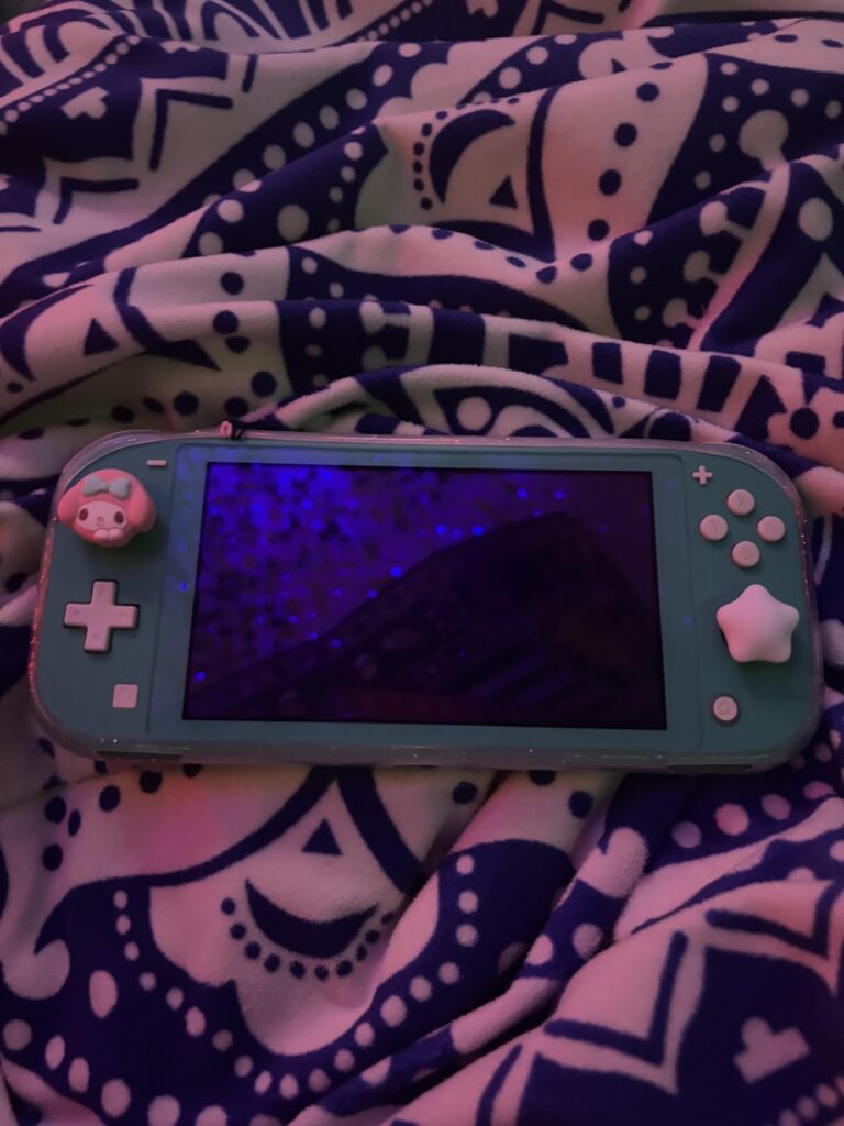 here’s my recently redecorated switch lite!!! should i put the stickers on the case???
