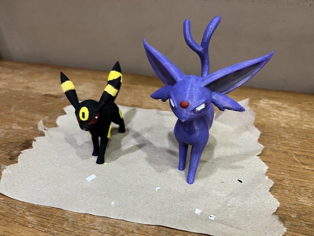 3D Printed and then painted of Espeon and Umbreon