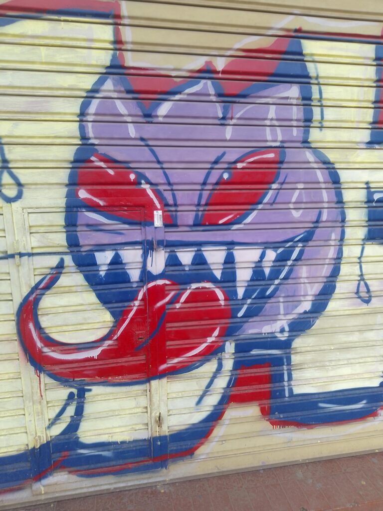 Took a pic of this graffiti, it reminds me of Gengar but i don't think it was the intention