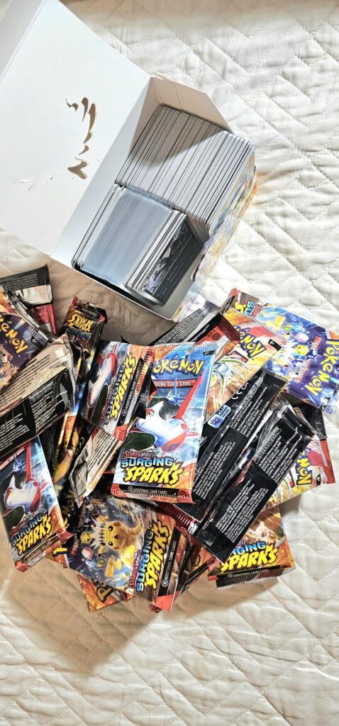 Opened a surging sparks booster box so you wouldn't have to