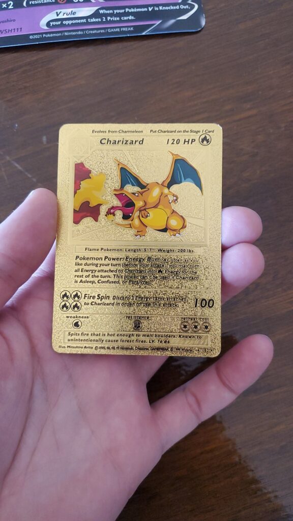 Is this golden charizard rare/valuable?