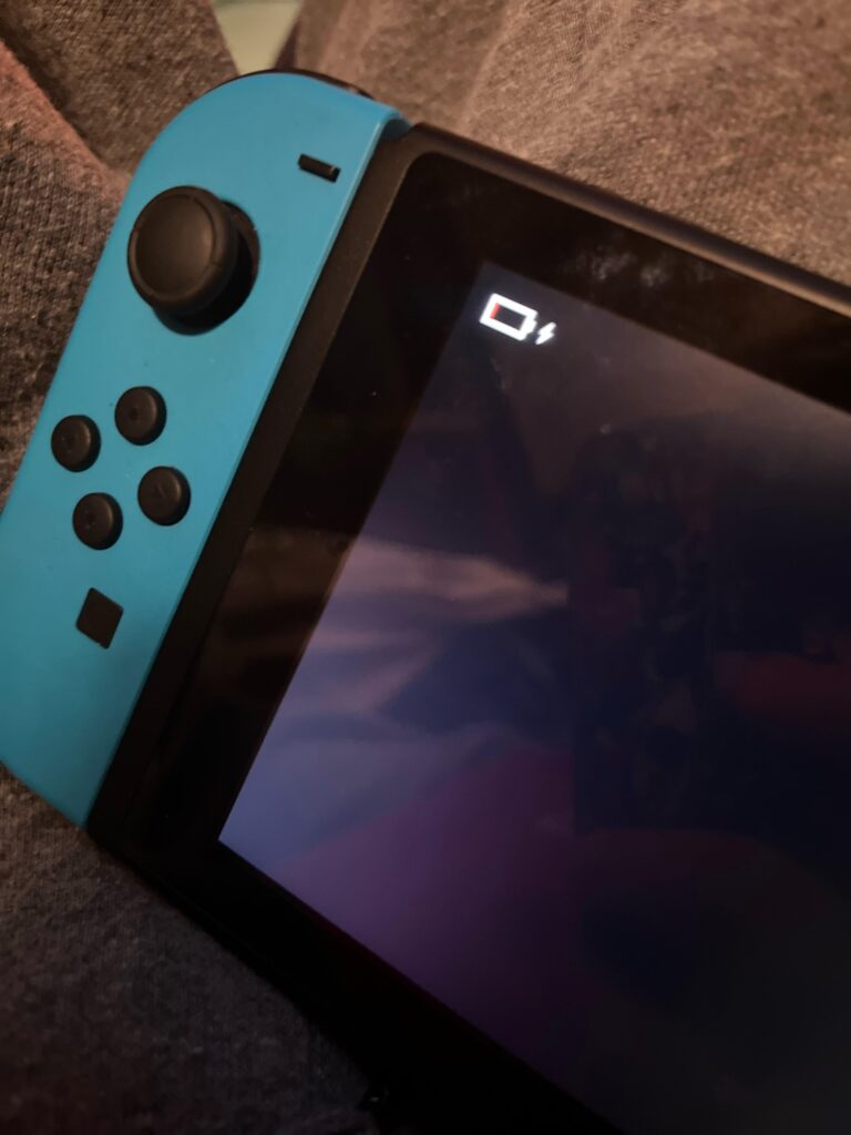 My switch keeps saying g this no matter how much I charge it or where I charge it