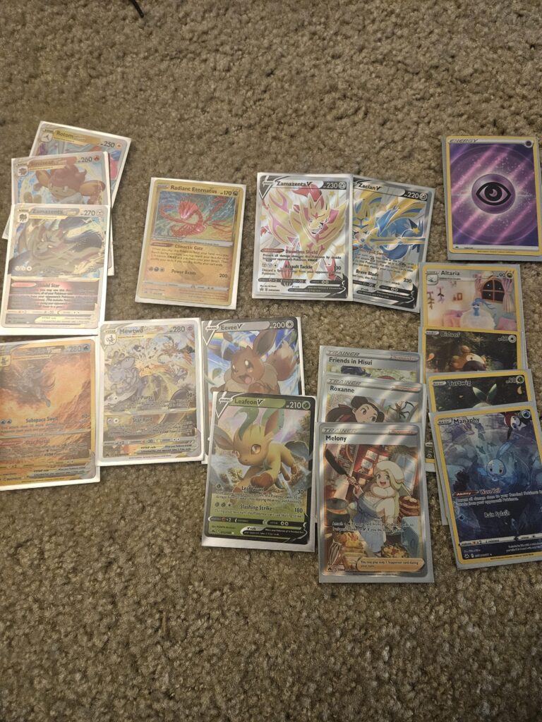Opened the crown zenith shiny zamazenta and zacian premium collection boxes, think I didn't do too bad.