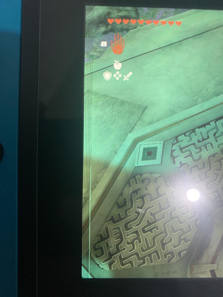I was just playing and random lines started appearing on my Switch. What happened? What can I do to fix this?