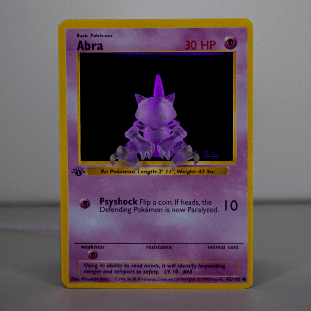 I made a 3d printed Abra sitting over the edge of his card [OC]