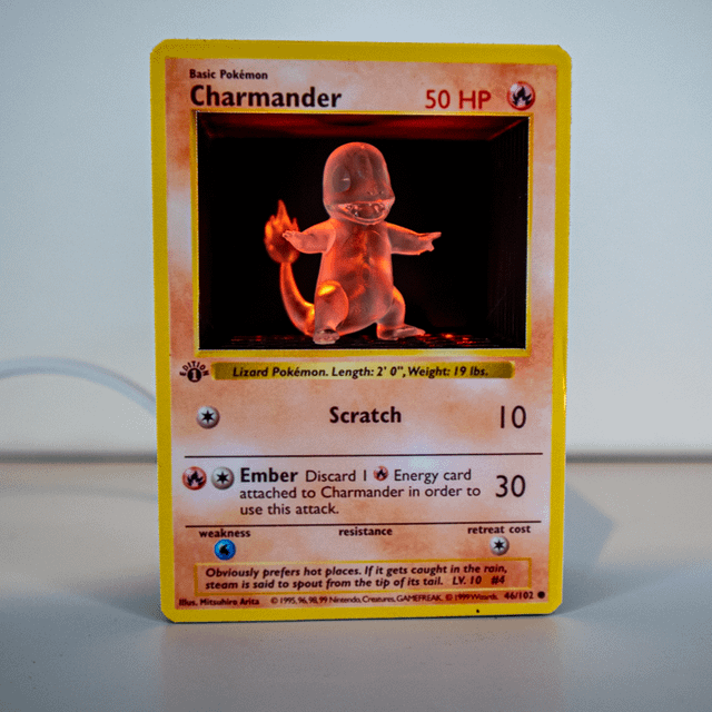 I made a 3d printed Charmander card with custom lighting [OC]