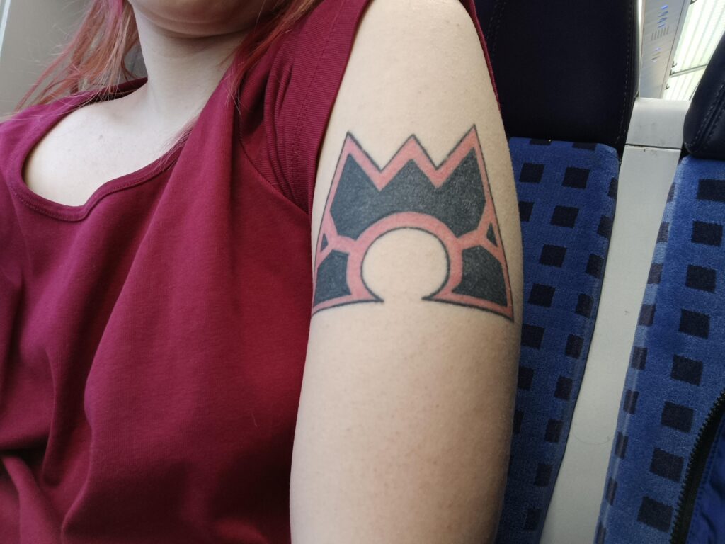 I don't think I posted this back then, but I got a Team Magma tattoo :D