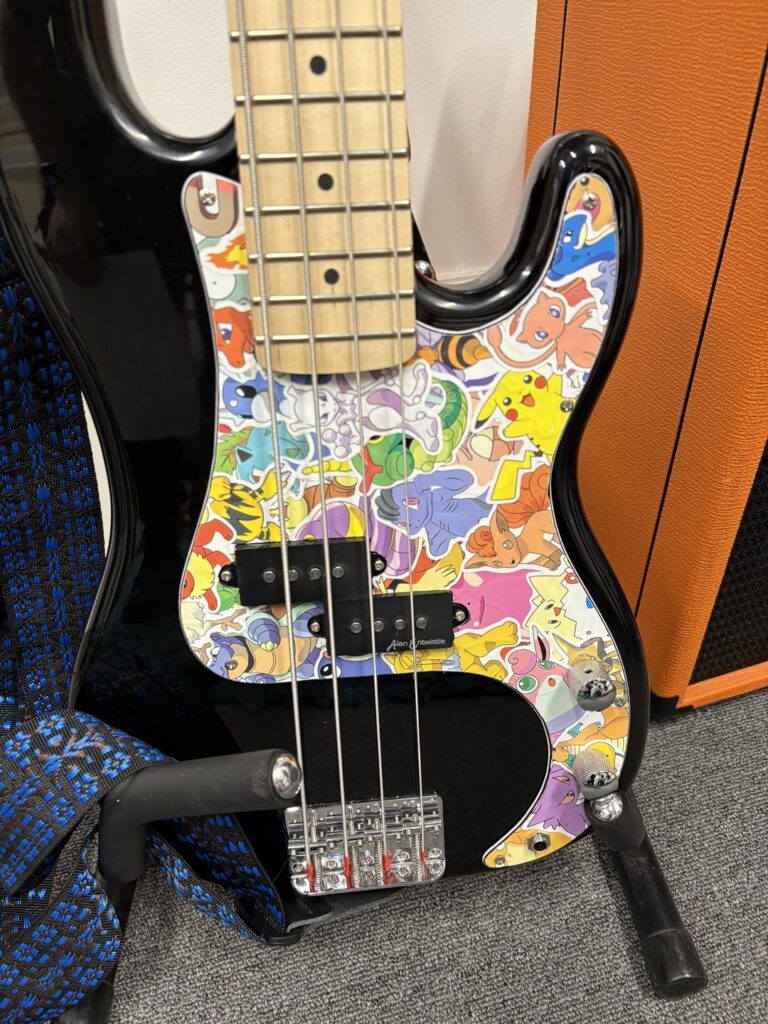 I made this custom scratch plate for a young, beginner bassist.