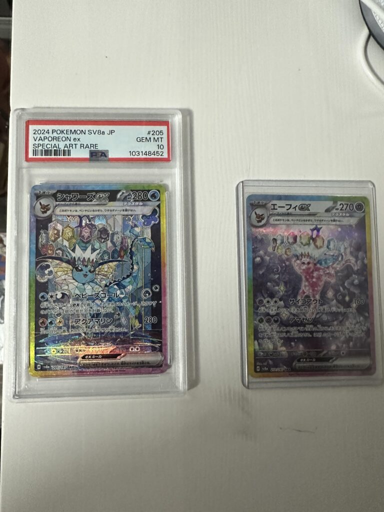 Ordered a PSA 10 Vaporeon from eBay, and I got a free Espeon with it???