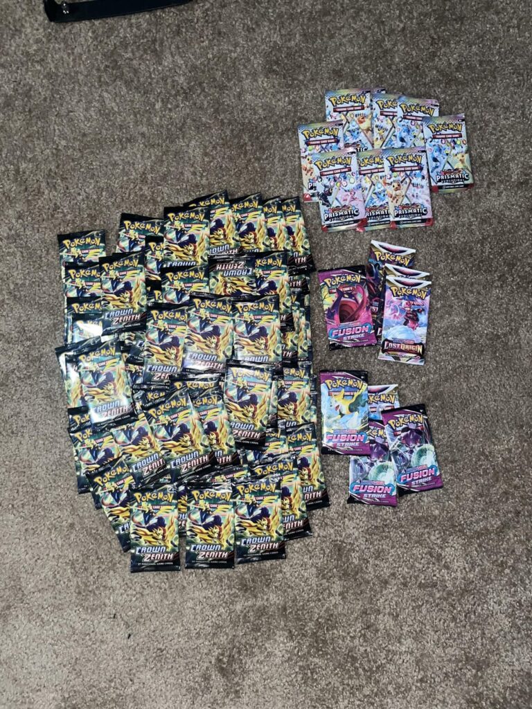 I opened 84 crown zenith packs, 9 prismatic, 4 fusion strike, and 4 lost origin so you didn’t have to. Here’s what I got