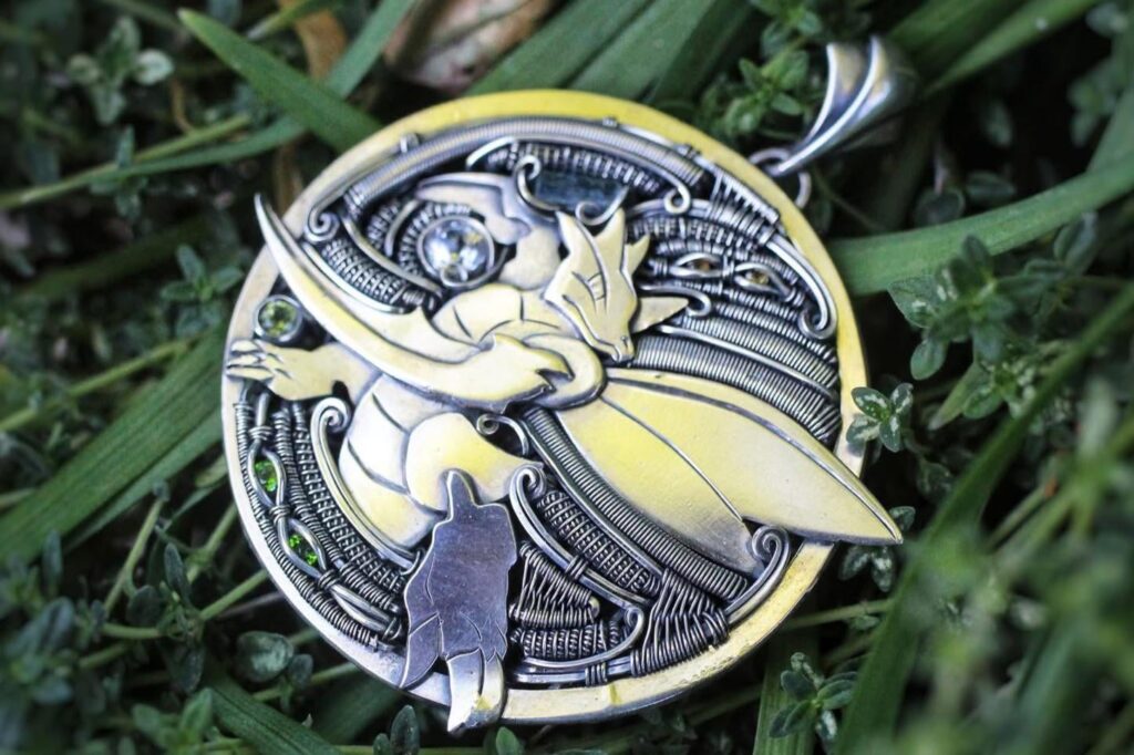 A friend and I collaborated and created this one of a kind pendant featuring my favourite mon, Scyther ☺️
