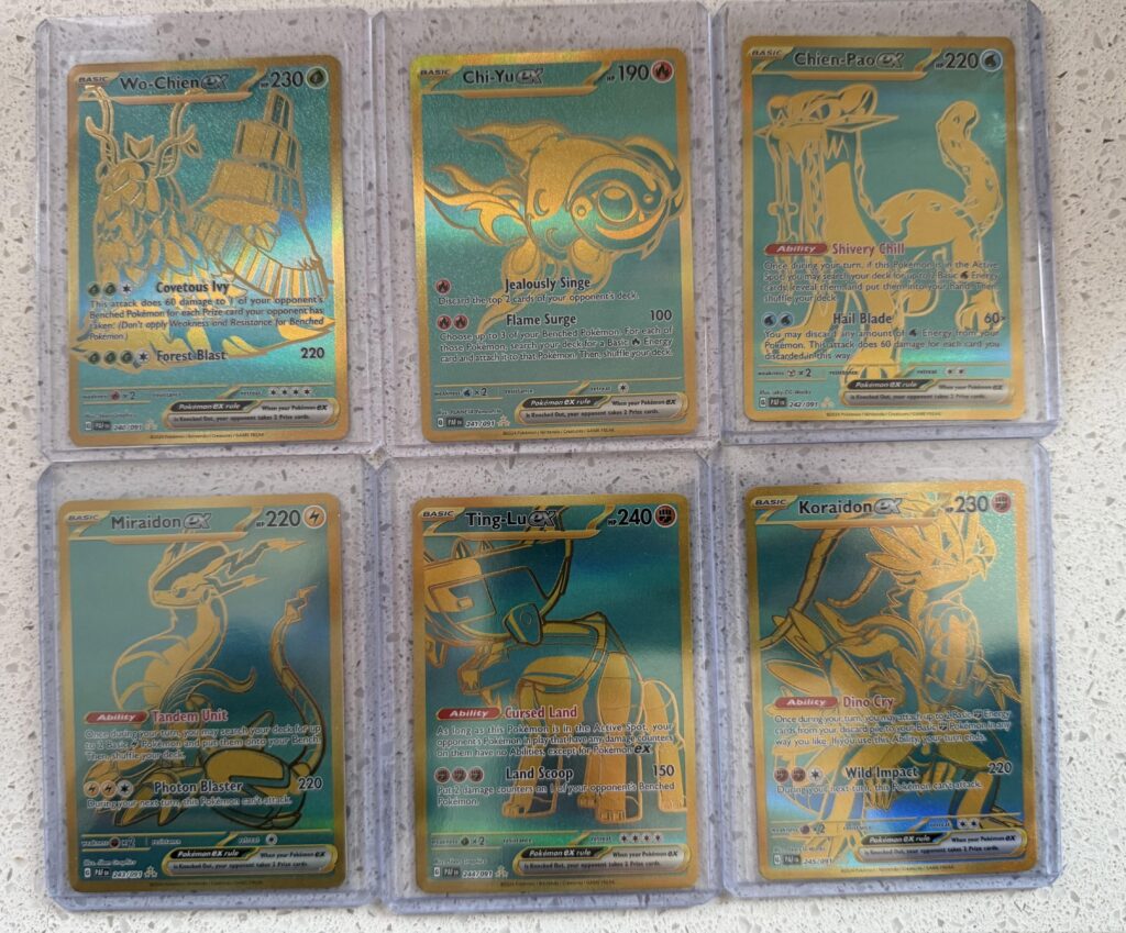 I finally completed my Paldean fates gold and teal set!
